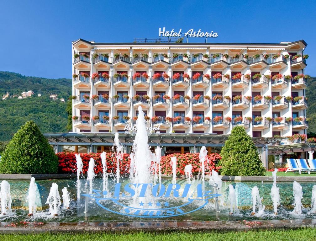 a fountain in front of the hotel albuquerque at Hotel Astoria in Stresa