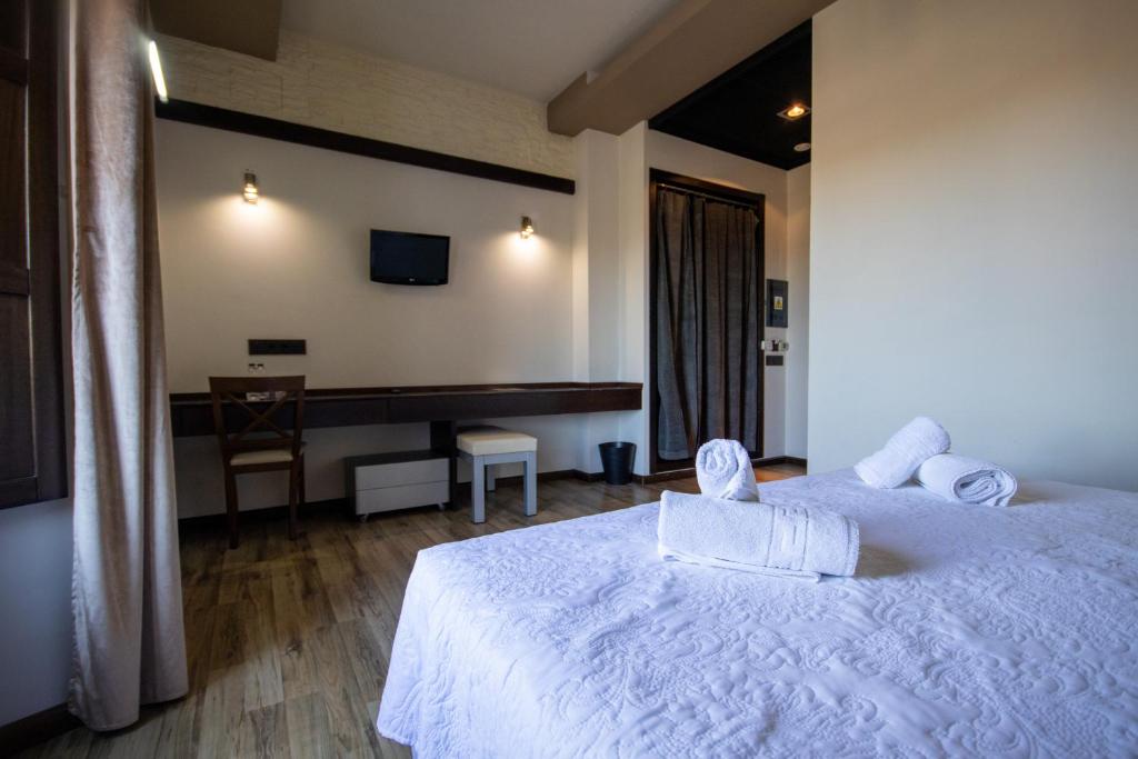 Postel nebo postele na pokoji v ubytování Hotel Villa De Setenil