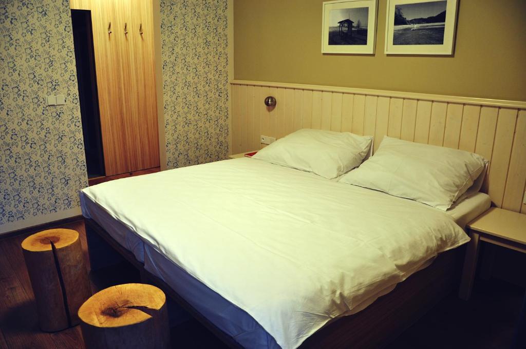 Postel nebo postele na pokoji v ubytování Wellness Hotel Bozeňov