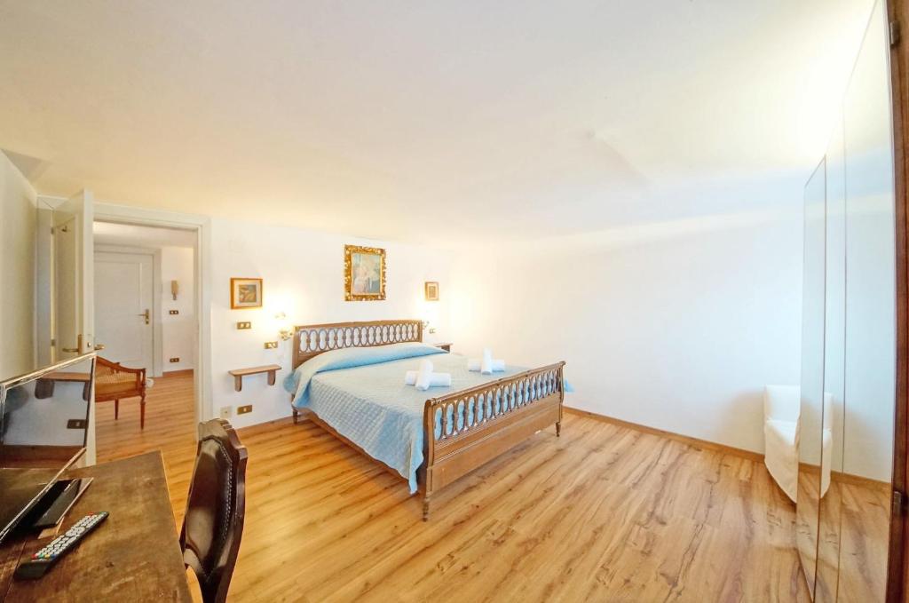 Posteľ alebo postele v izbe v ubytovaní DolceVita Apartments N 304 Rialto Mercato