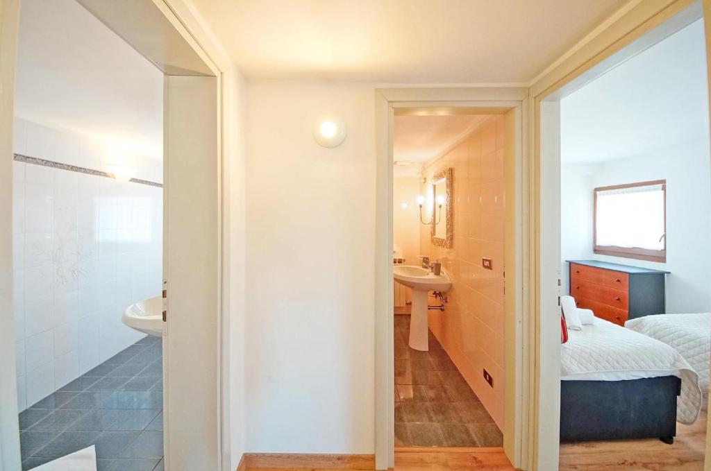 Posteľ alebo postele v izbe v ubytovaní DolceVita Apartments N 304 Rialto Mercato