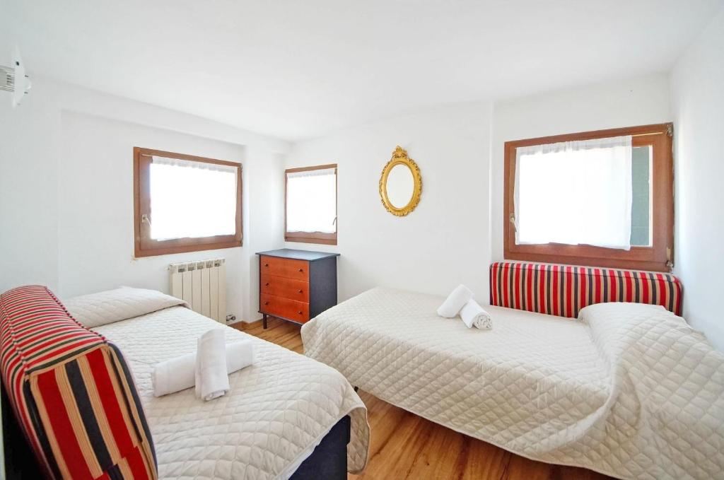 Posteľ alebo postele v izbe v ubytovaní DolceVita Apartments N 304 Rialto Mercato