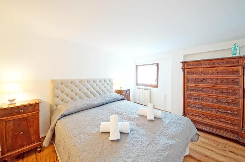 Posteľ alebo postele v izbe v ubytovaní DolceVita Apartments N 304 Rialto Mercato