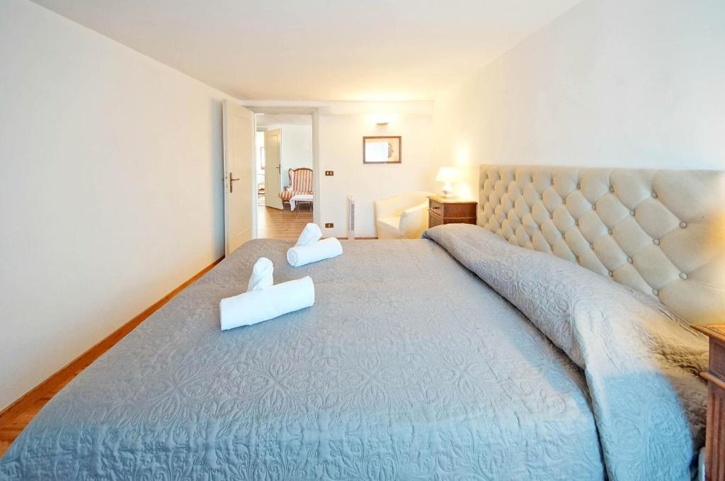 Posteľ alebo postele v izbe v ubytovaní DolceVita Apartments N 304 Rialto Mercato