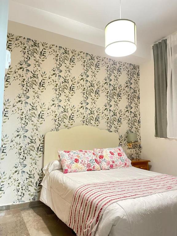 Postel nebo postele na pokoji v ubytování Hotel Corona de Atarfe