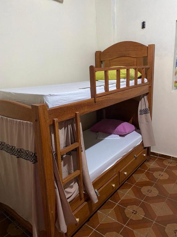 Postel nebo postele na pokoji v ubytování Hostel Roraima