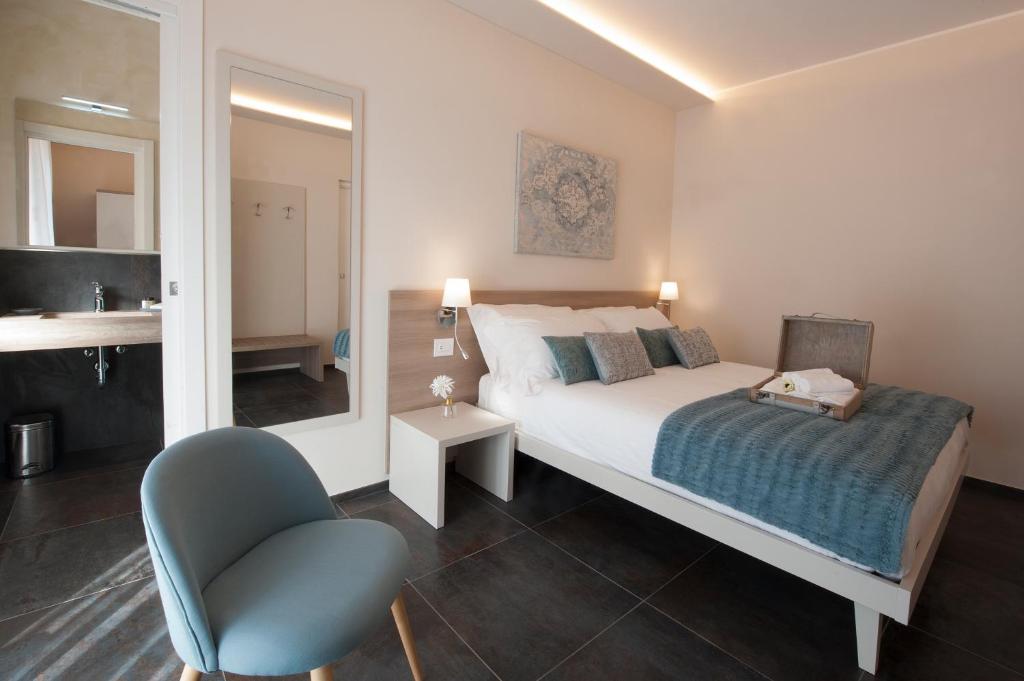 Posteľ alebo postele v izbe v ubytovaní Brichett Deluxe Rooms