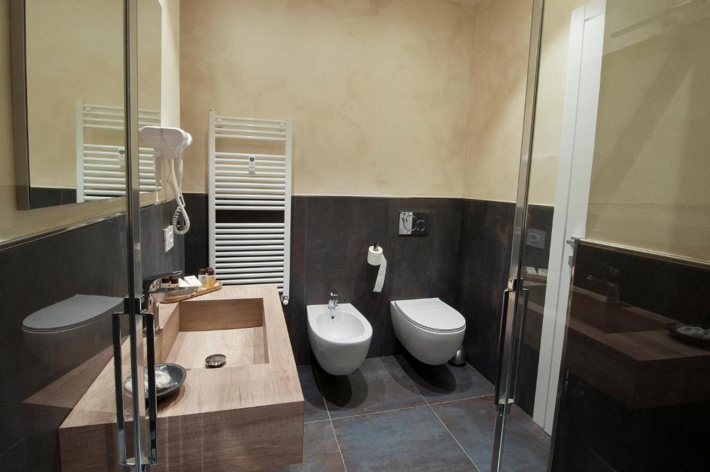 Kúpeľňa v ubytovaní Brichett Deluxe Rooms