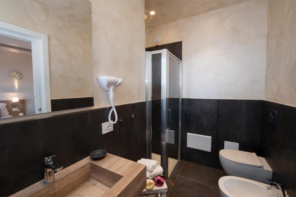 Kúpeľňa v ubytovaní Brichett Deluxe Rooms