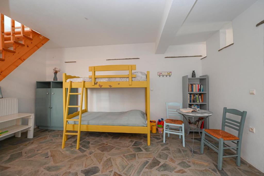 Postel nebo postele na pokoji v ubytování Astraia