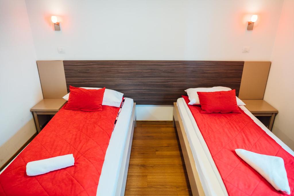 Postel nebo postele na pokoji v ubytování Hotel Walter