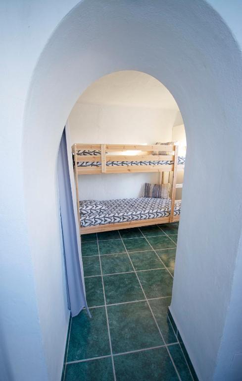 Postel nebo postele na pokoji v ubytování Casa Rosario, Frigiliana Large Historic Townhouse with Amazing Roof terrace HansOnHoliday Rentals