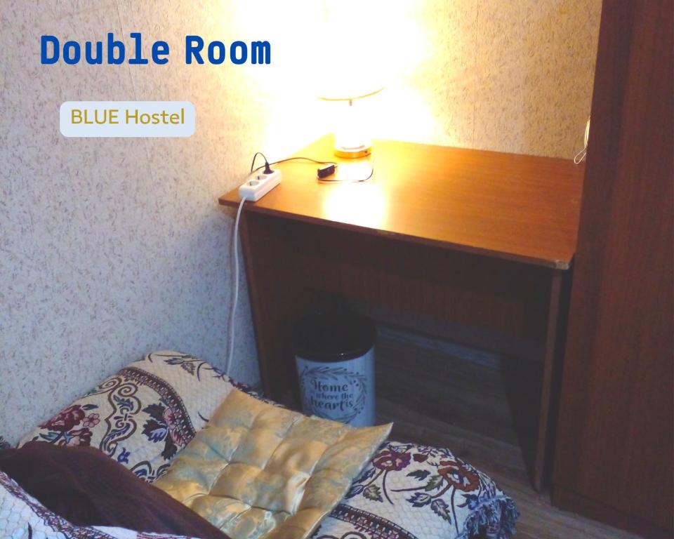 Postel nebo postele na pokoji v ubytování BLUE Hostel - check message after booking