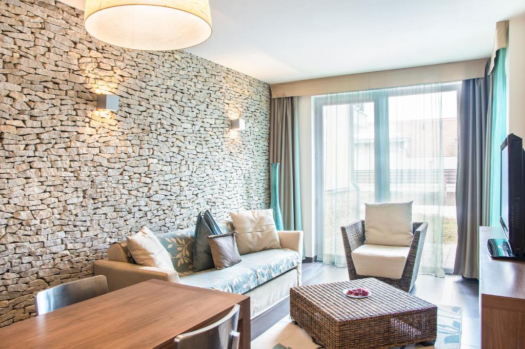 Posezení v ubytování Echo Residence All Suite Hotel
