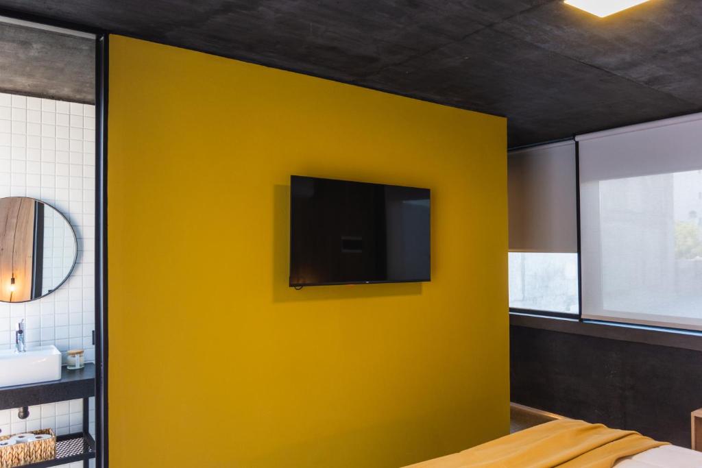 TV a/nebo společenská místnost v ubytování Faz Hostel