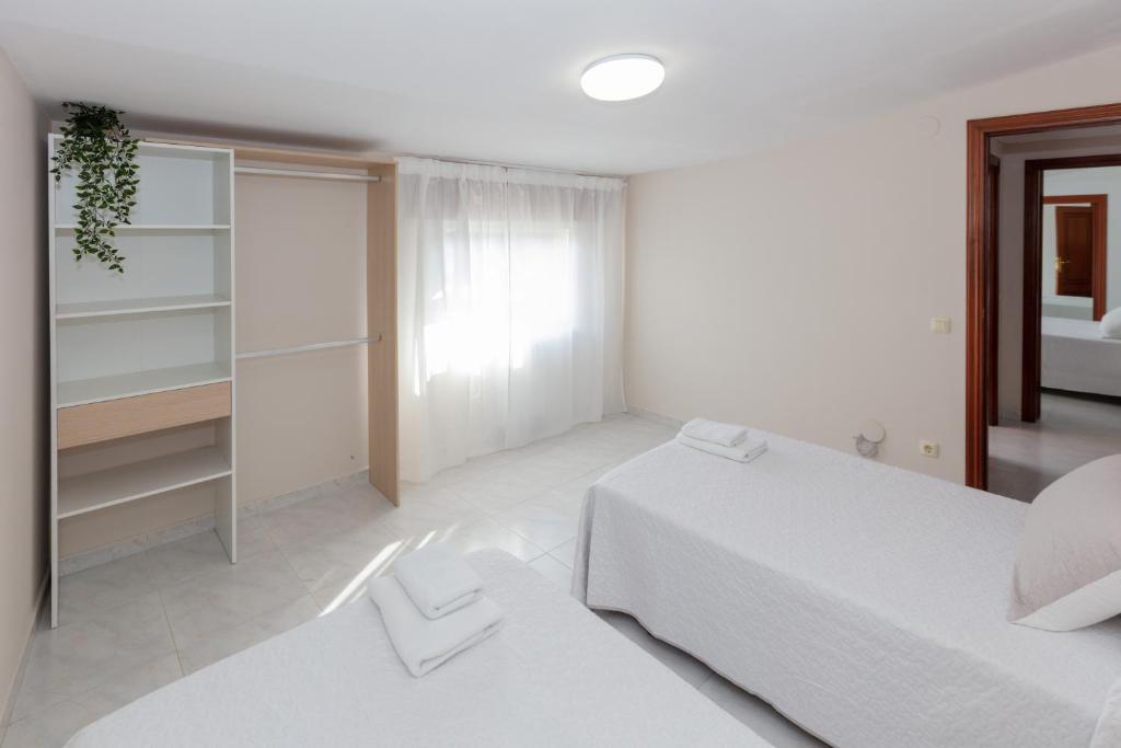 Postel nebo postele na pokoji v ubytování Casa Adriana