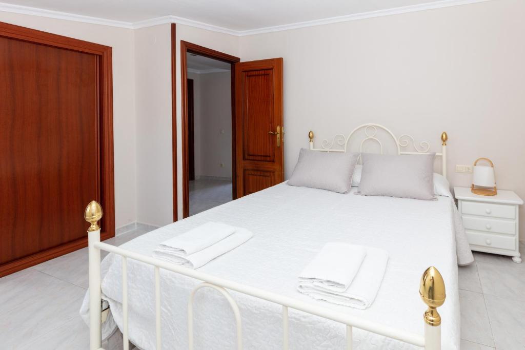 Postel nebo postele na pokoji v ubytování Casa Adriana