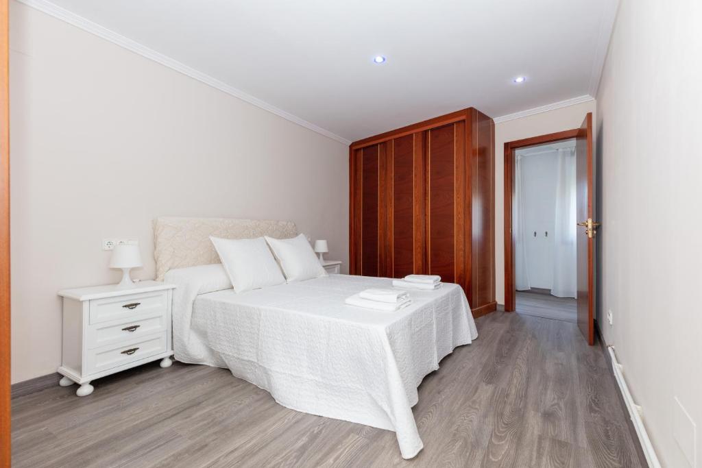 Postel nebo postele na pokoji v ubytování Casa Adriana