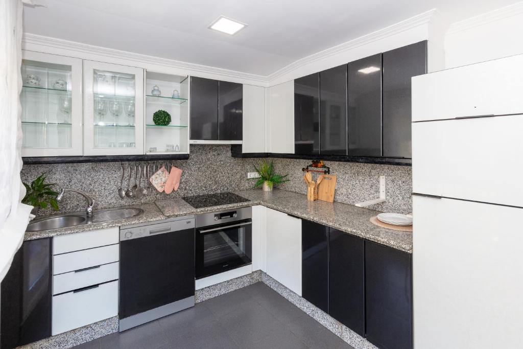 Kuchyň nebo kuchyňský kout v ubytování Casa Adriana