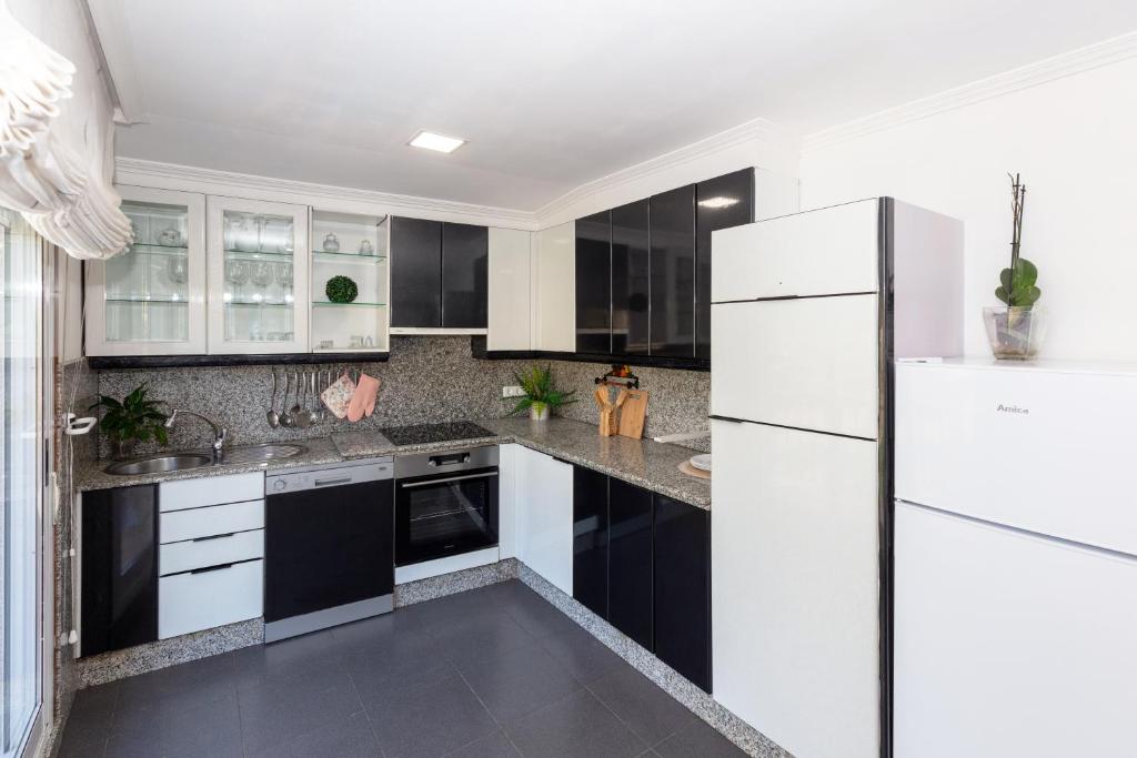 Kuchyň nebo kuchyňský kout v ubytování Casa Adriana