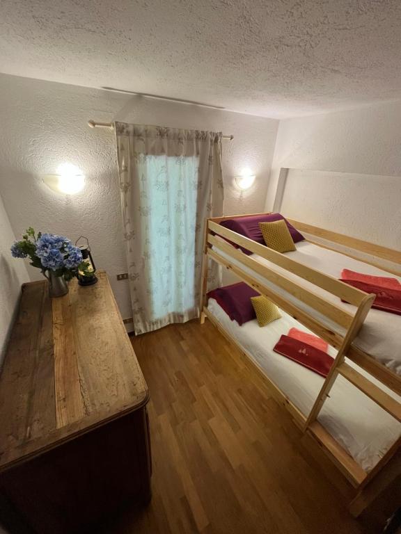 Postel nebo postele na pokoji v ubytování Chalet Blanc "Le Flocon"