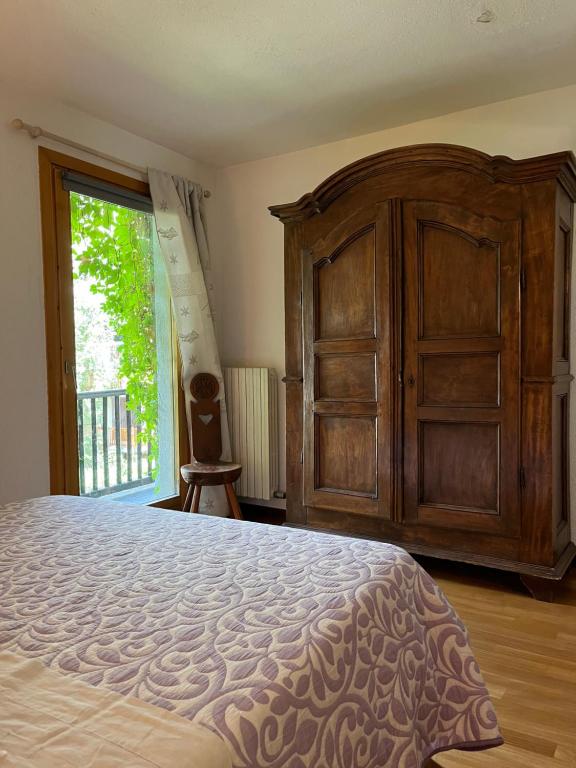 Postel nebo postele na pokoji v ubytování Chalet Blanc "Le Flocon"