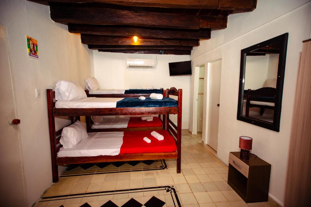 Casa Hotel Marbella Beach客房内的一张或多张床位