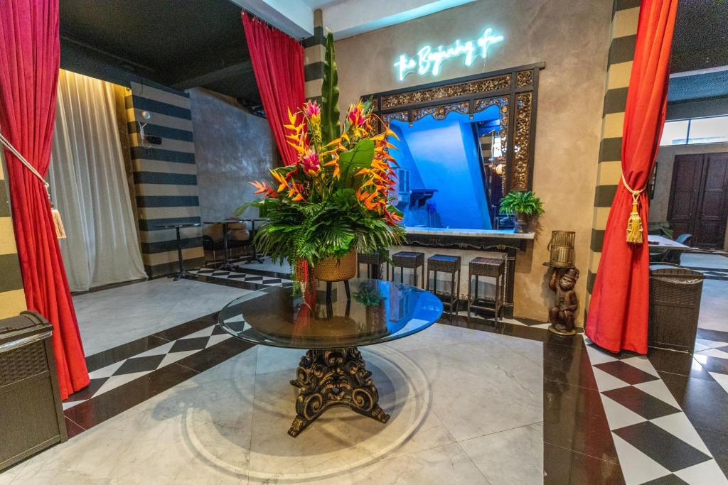 TV a/nebo společenská místnost v ubytování CasaBlanca Hotel