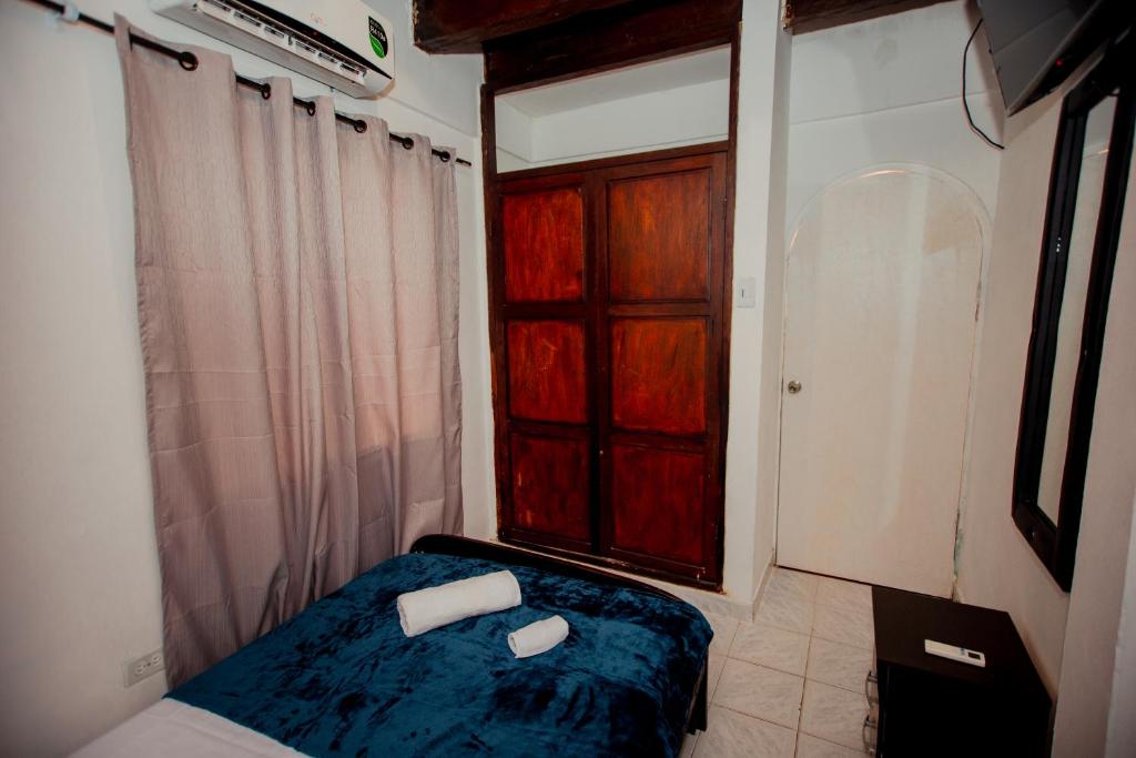 Casa Hotel Marbella Beach客房内的一张或多张床位