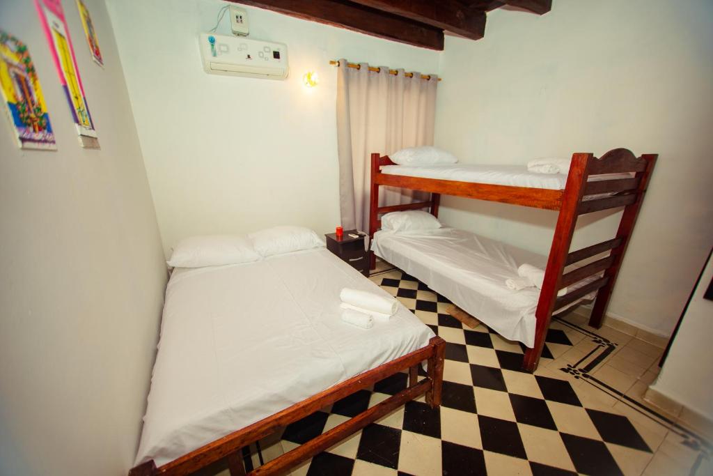 Casa Hotel Marbella Beach客房内的一张或多张床位