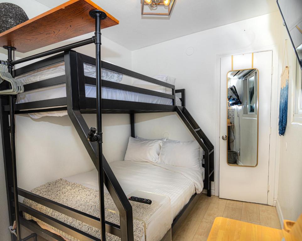 Krevet ili kreveti na sprat u jedinici u okviru objekta All-in-One Cozy Retreat