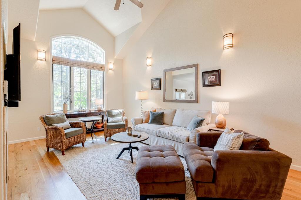 a living room with a couch and a table at Cobble Creek Pearl in Driggs