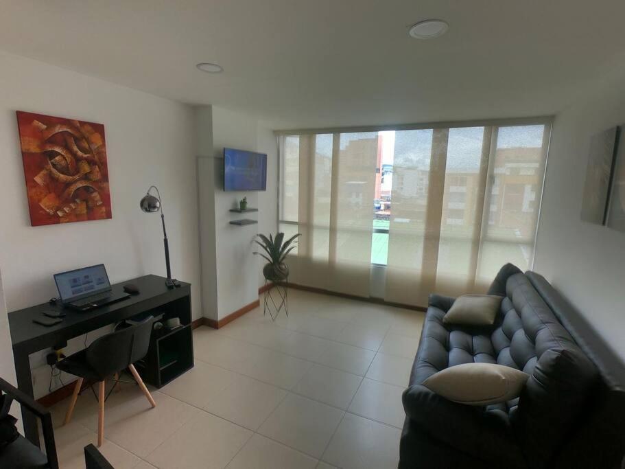 Posezení v ubytování Hermoso y acogedor apartamento a un paso de todo!