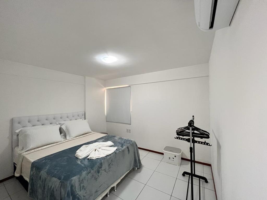 Postel nebo postele na pokoji v ubytování Apartamentos 250m da Orla -Edifício Nugali- Castelo B Temporada