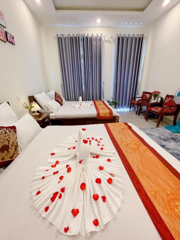 Postel nebo postele na pokoji v ubytování Moc Nhien Hostel Da Lat