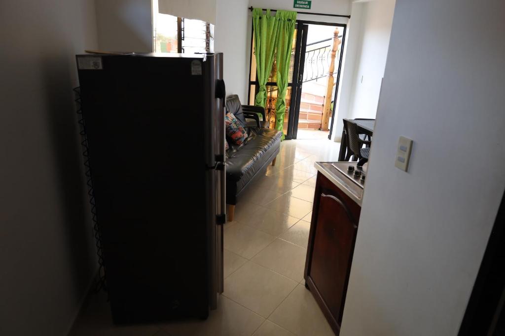 Kuchyň nebo kuchyňský kout v ubytování Apartahotel El Horizonte