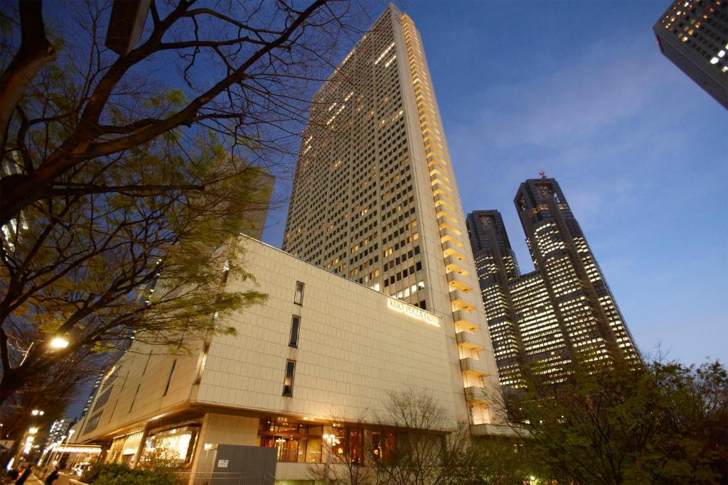 a large building in a city with tall buildings at Keio Plaza Hotel Tokyo in Tokyo