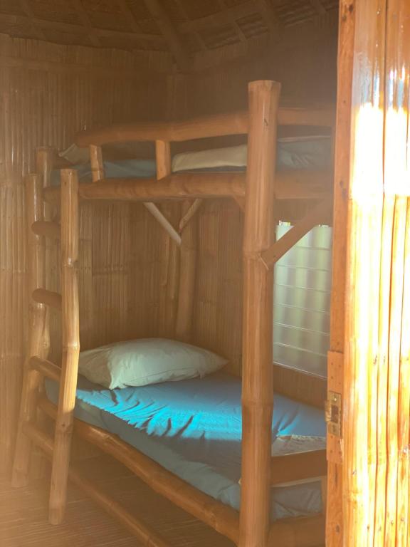 Postel nebo postele na pokoji v ubytování RUSTIQUE RUE Mabini - Hostel