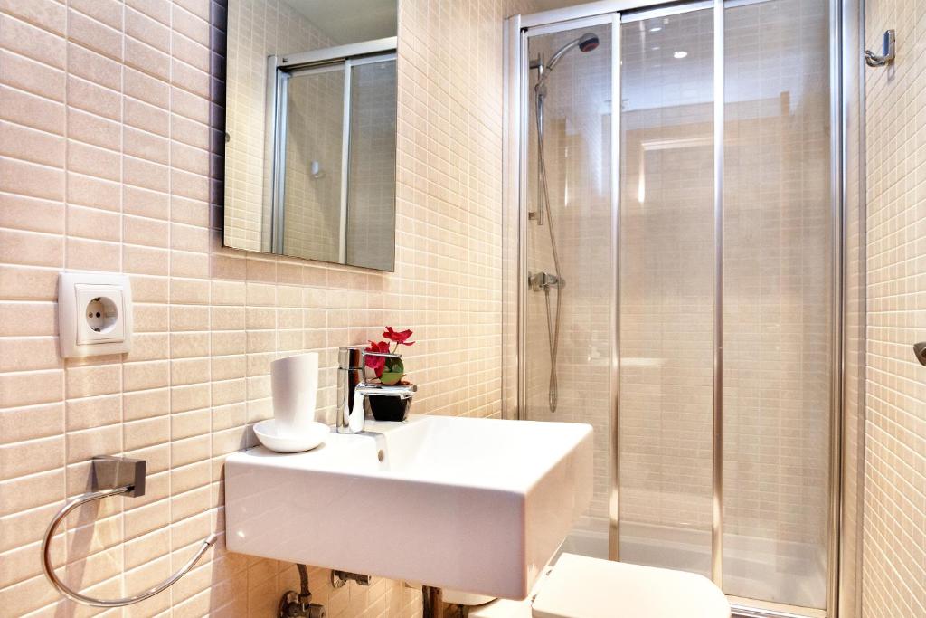 Kúpeľňa v ubytovaní Feelathome Center Apartments