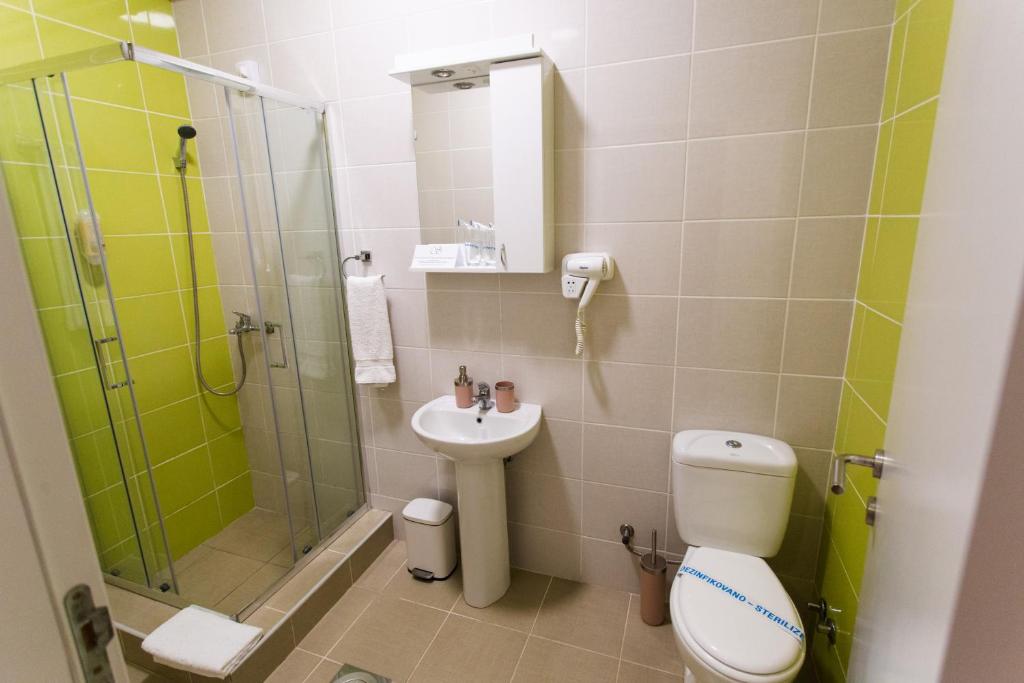Koupelna v ubytování Hotel Srem