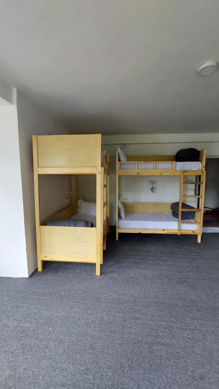 Postel nebo postele na pokoji v ubytování La Heim Hostels