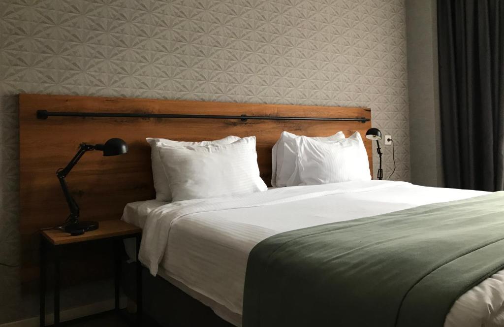 Letto o letti in una camera di Hotel Stancia Kazbegi - City Center