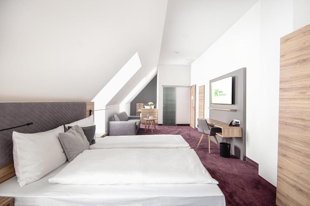 Postel nebo postele na pokoji v ubytování Hotel Kupferzell