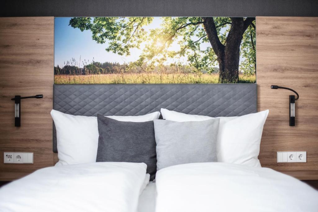 Postel nebo postele na pokoji v ubytování Hotel Kupferzell