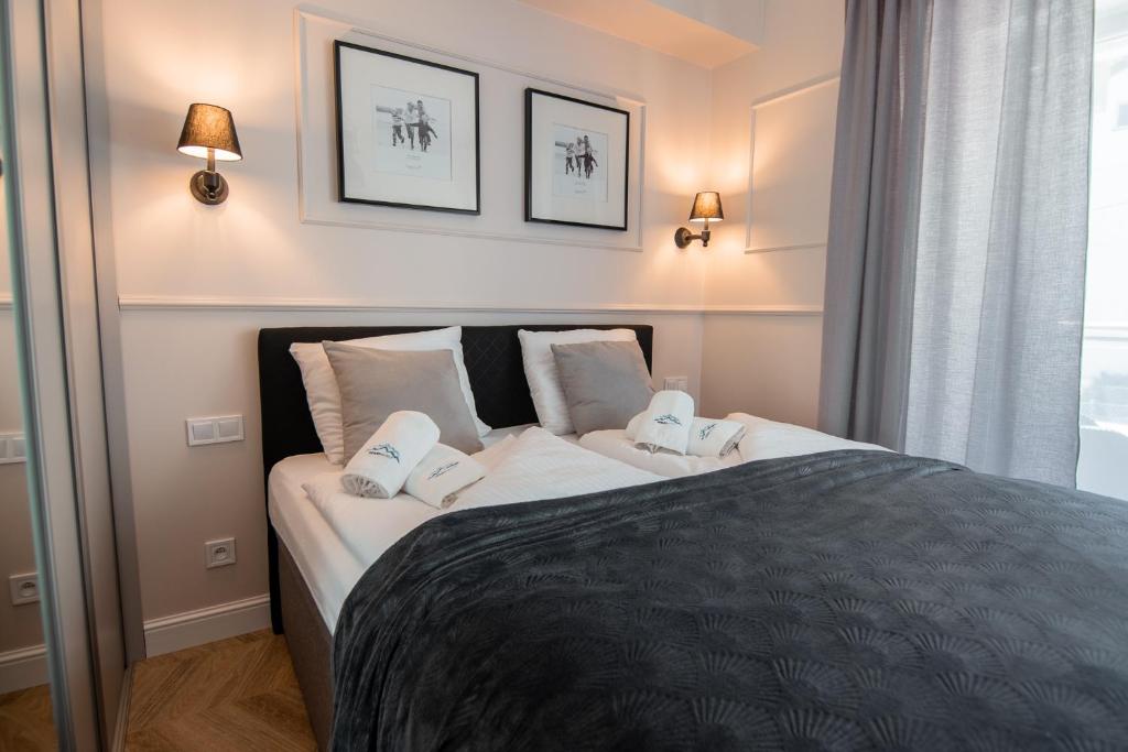 Posteľ alebo postele v izbe v ubytovaní Apart Invest Centrum Park 7