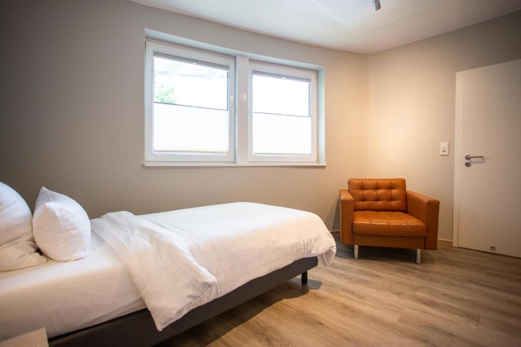Postel nebo postele na pokoji v ubytování Hotel Circle Inn