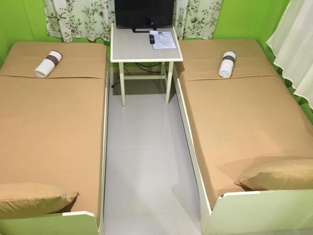Postel nebo postele na pokoji v ubytování Twin AP Homes