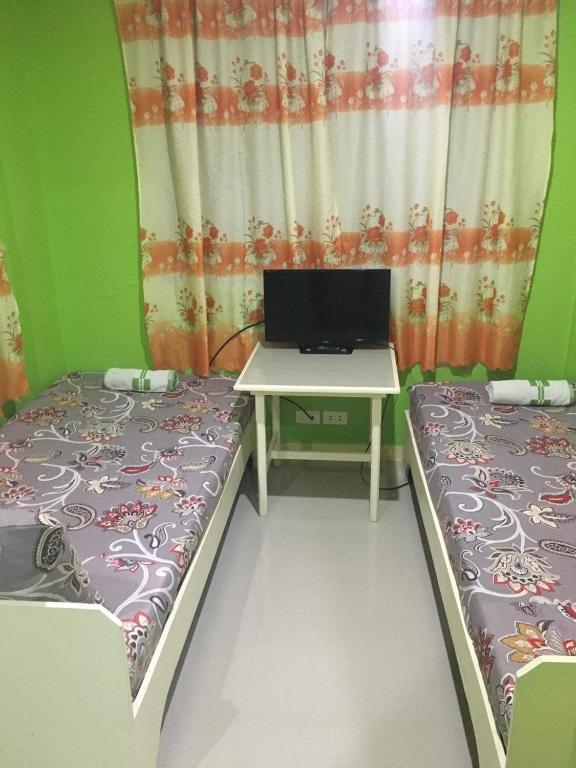 TV a/nebo společenská místnost v ubytování Twin AP Homes