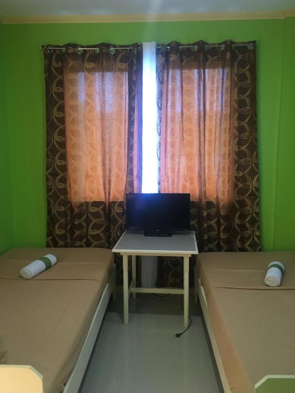 Postel nebo postele na pokoji v ubytování Twin AP Homes