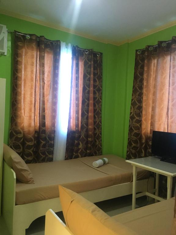 Postel nebo postele na pokoji v ubytování Twin AP Homes